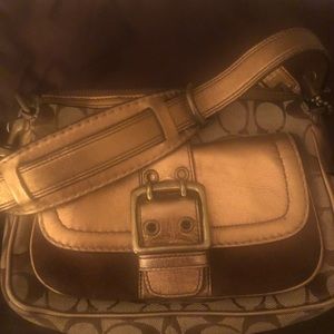 Coach purse with dust cloth